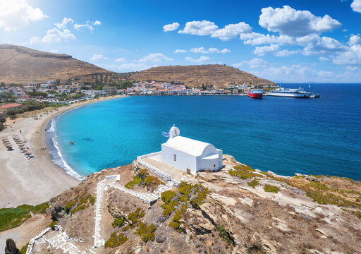 Aerial view of the little chapel of Agios Giorgios in front of the beach and village at Korissia, Kea, Tzia island, Cyclades, Greece