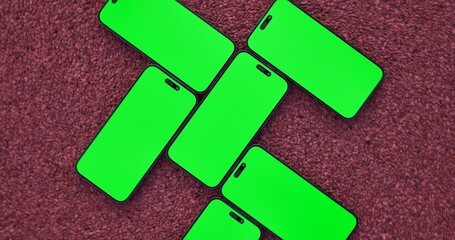 Smartphones with blank green screen . Modern frameless design