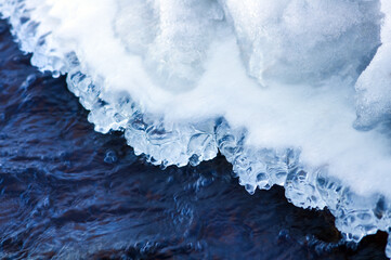 Frozen spring river. - 756589313