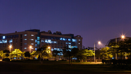 Fototapeta na wymiar Night view of Guangzhou University campus in China. Guangzhou, China campus night scenery.