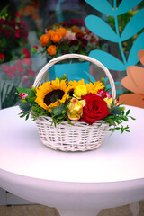 Basket of Flowers on Table