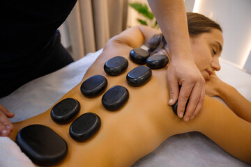 Tranquil Retreat: Hot Stone Massage Session