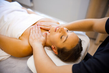 Fototapeta na wymiar Relaxing Neck Massage by a Professional Masseur