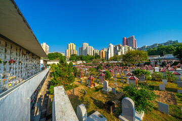 Cemitério de nossa senhora da piedade, Cemetery in Macao with tall buildings in the background