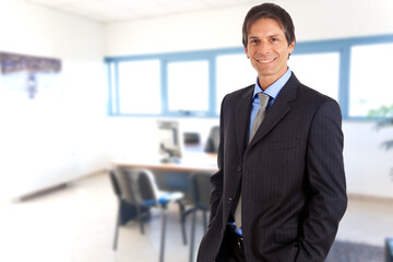 Confident businessman in office environment