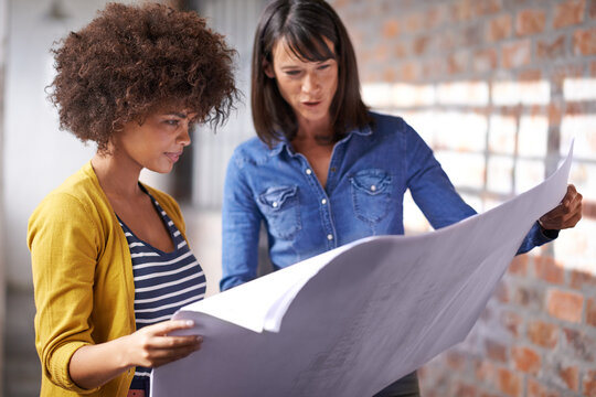Business people, blueprints and teamwork for building design, architects and internship in office. Colleagues, communication and paperwork in creative agency, project management and collaboration