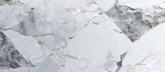 Obraz premium High-resolution white and grey marble texture background featuring a top-down perspective of luxurious natural stone tiles with a seamless glitter pattern.