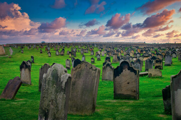 Monastery Cemetery at sunset in Whitby, North Yorkshire, UK
