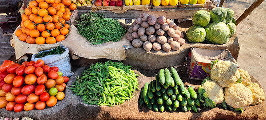 Fruits and vegetables Shop In Pakistan. A lot of vegetables. Market. store. Background. citruses. Seller displayed many fresh vegetables on stall market. Many types of fruits and vegetabes. 4K Footage - obrazy, fototapety, plakaty
