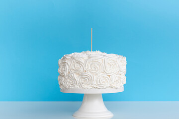 Cake topper mock up . Styled with against a blue background. Close up birthday , wedding cake topper mockup