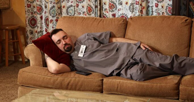 Scrub Life Non-Binary Nurse Sleeps on Couch WS