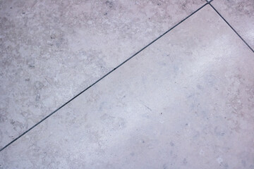 Old grey paving slabs, background or texture