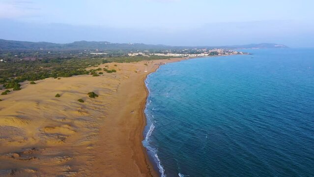 Issos beach on Corfu, near Agios Georgios, Greece. Aerial drone view of Issos beach and Lake Korission, Corfu island, Ionian Sea, Greece. Issos beach, Corfu Island.