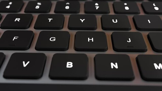 A closeup image of a black keyboard with white keys, a common input device for computers and laptops. The keys are arranged in a rectangle, making it an essential laptop accessory