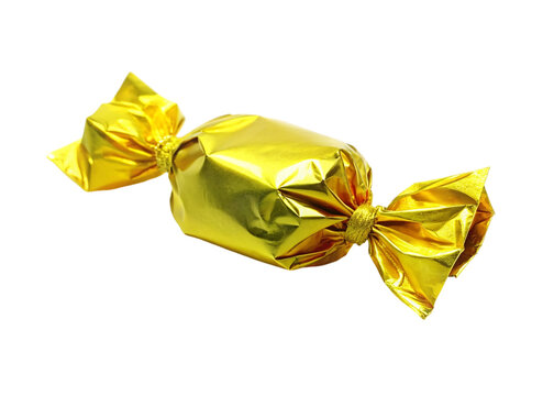 Candy in golden wrapper isolated on transparent background.