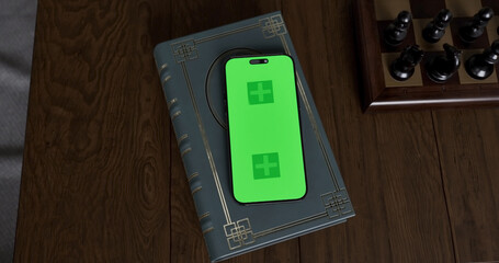 Smartphone place on table, Green screen of Cellphone, Close up display mobile phone with mock up, Chroma key display