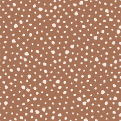 Brown seamless pattern with beige spots