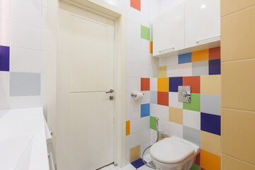 modern bathroom room with toilet and washing machine