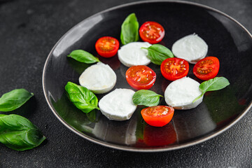 caprese salad mozzarella, tomato, basil fresh food tasty healthy eating cooking appetizer meal food snack on the table copy space food background rustic top view