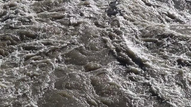 River in flood with rushing water
