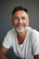 Obraz premium Smiling Man With Grey Hair and Beard