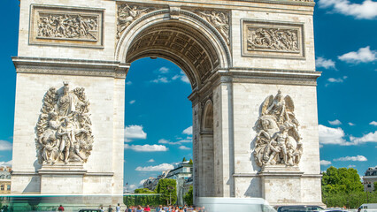 The Arc de Triomphe Triumphal Arch of the Star timelapse is famous monument in Paris - obrazy, fototapety, plakaty