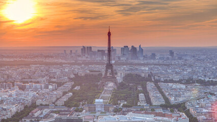 Panorama of Paris at sunset timelapse. Eiffel tower view from montparnasse building in Paris - France