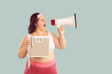Funny fat woman in sportswear holding scales and measuring tape in hands and shouting announcement...