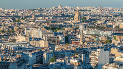 Aerial panorama above many houses rooftops in a Paris timelapse