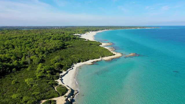Aerial view of Baia dei Turchi, Puglia region, Italy. Turkish Bay (or Baia dei Turchi), this coast of Apulia is one of the most important ecosystems in Salento, Italy. Seacoast of Baia dei Turchi.