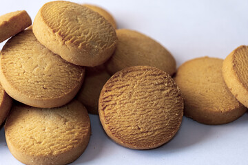 butter cookies on white background close up macro top view