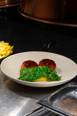 In the restaurant, a dish with cutlets and creamy mashed potatoes is being served