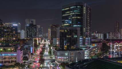 Aerial view of traffic on Eu Tong Sen Street and new bridge road all the way to Chinatown night timelapse © HyperlapsePro