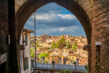 Perugia beautiful historical center from 'Via Appia' medieval arch - 756676544