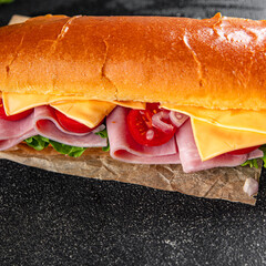ham sandwich sliced meat, cheese, lettuce, tomato, vegetable, bun bread fresh food tasty eating meal food snack on the table copy space food background rustic top view