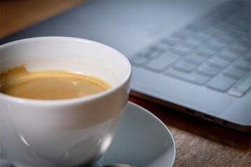 cup of coffee and laptop