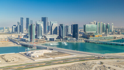 Fototapeta na wymiar Aerial skyline of Abu Dhabi city centre from above timelapse