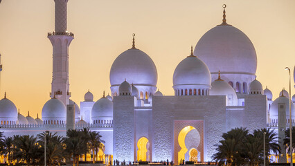 Sheikh Zayed Grand Mosque in Abu Dhabi day to night timelapse after sunset, UAE