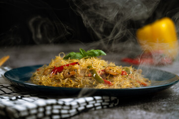 Smoky Asian salad with glass noodles, chicken, prawn, shrimp and vegetables