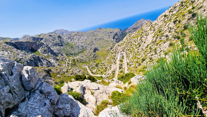 Breathtaking view of the hairpin curves along the bush covered northwest mountain ranges leading to Sa Calobra in Mallorca