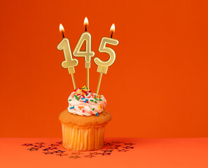 Number 145 candle - Birthday card design in orange background