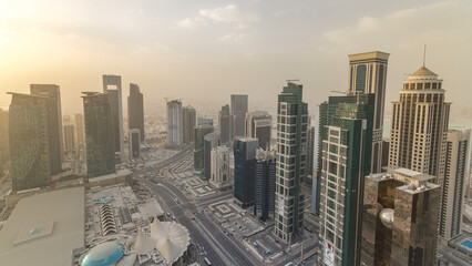 Skyscrapers before sunset timelapse in the skyline of commercial center of Doha