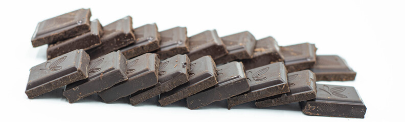 world chocolate day .pieces of chocolate on white background,