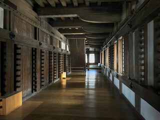 Fototapeta premium Cultural Tapestry: Inner wooden architecture of Himeji Catsle, Hyōgo Prefecture, Japan