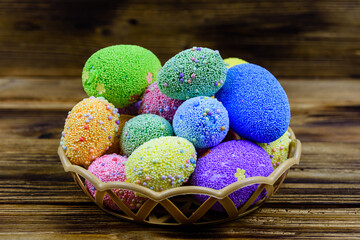 Easter eggs made of styrofoam on a wooden background