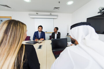 Multiethnic business team working in Dubai