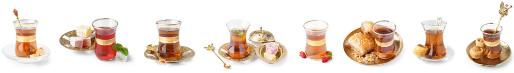 Set of traditional cups with Turkish tea and sweets on white background