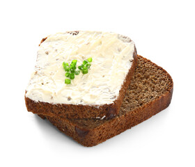 Bread with butter and slices of green onion on white background