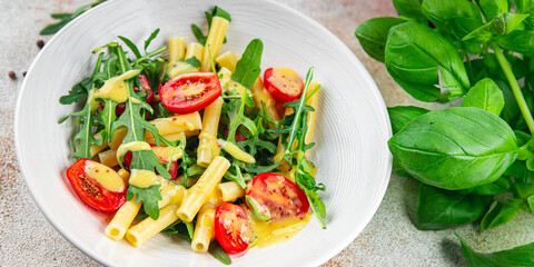 pasta salad tomato, arugula, pasta fresh food tasty eating meal food snack on the table copy space food background 