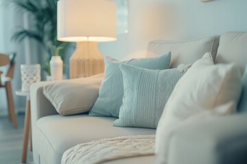 Fototapeta premium A living room filled with various furniture pieces and a standing lamp, creating a cozy and functional space.